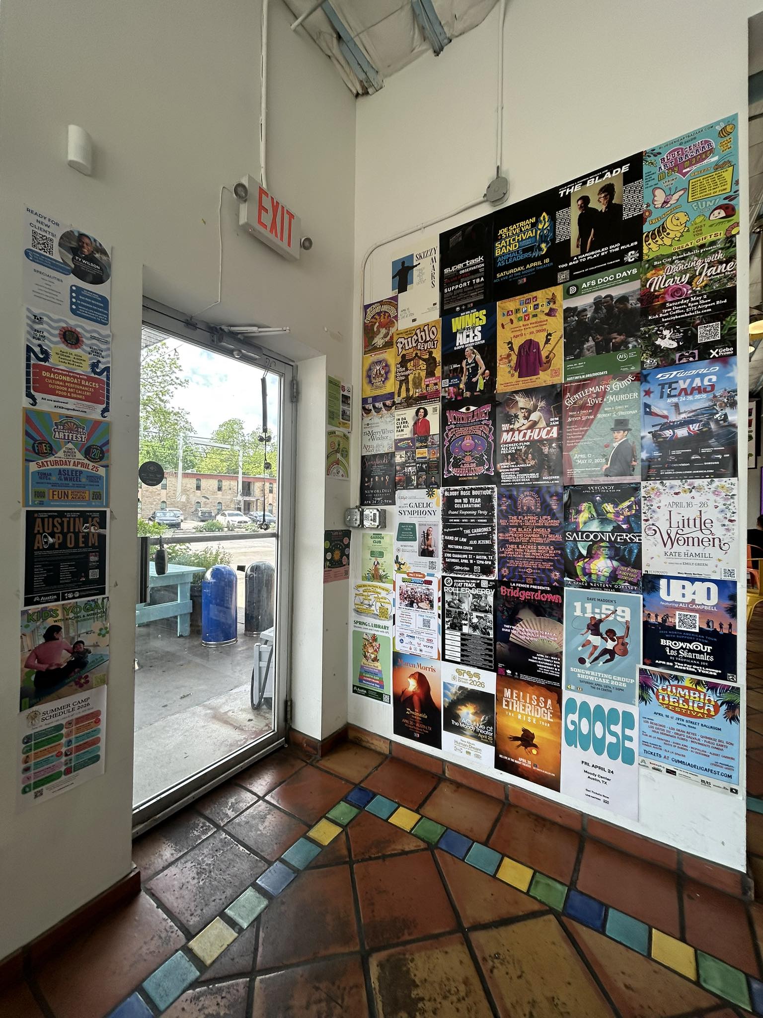 Austin storefront with a wall of Motorblade-distributed flyers